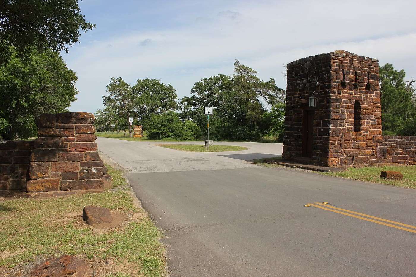 The entrance to Bastrop State Park on Park Road 1A through the native sandstone portal built by the Civilian Conservation Corps in the mid-1930s.