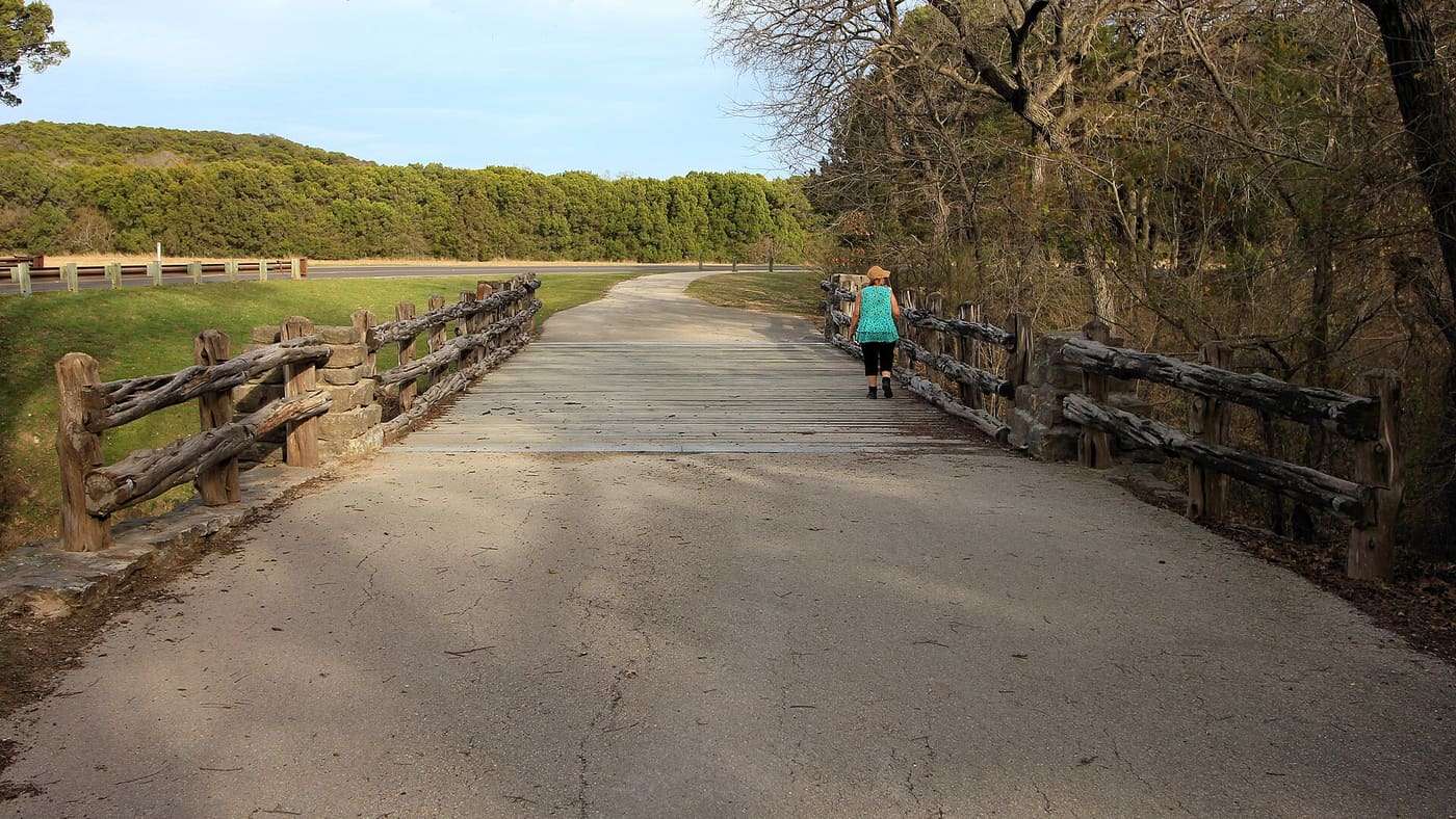 Civilian Conservation Corps Company 3804 developed features like Camp Creek Bridge in Cleburne State Park in Johnson County, Texas between 1935 and 1940.